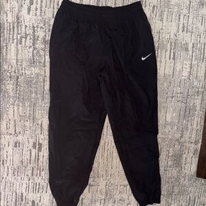 Nike Black Track Tech Pants XL elastic cuffs about 30 inseam. Worn once